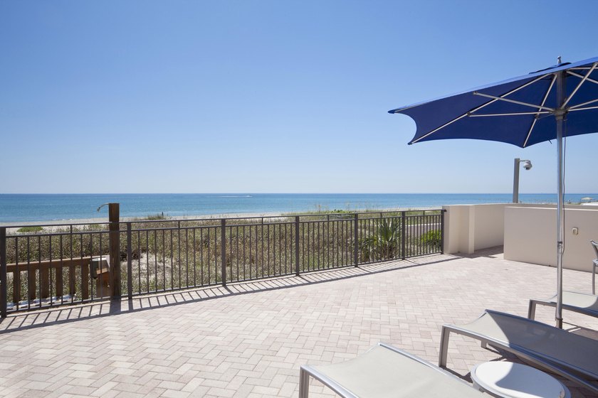 RARELY AVAILABLE BEACHFRONT VILLA OFFERING EFFORTLESS - photo 22