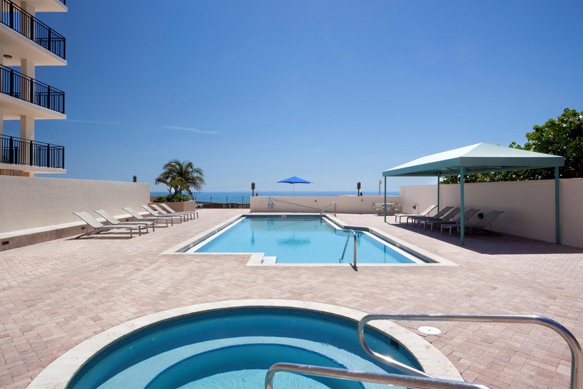 RARELY AVAILABLE BEACHFRONT VILLA OFFERING EFFORTLESS - photo 23