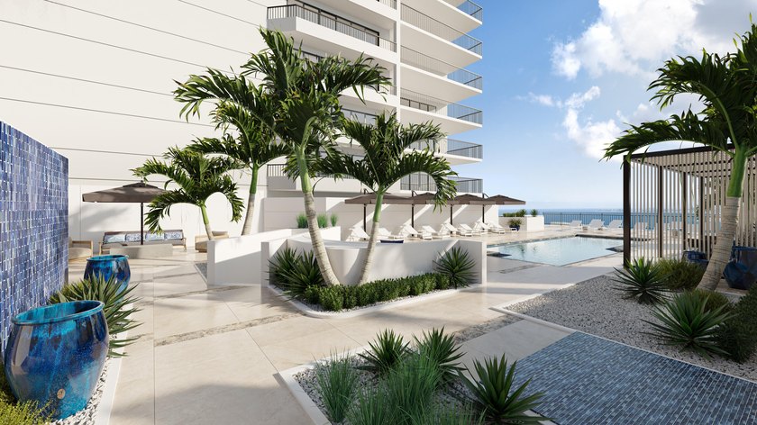 RARELY AVAILABLE BEACHFRONT VILLA OFFERING EFFORTLESS - photo 27
