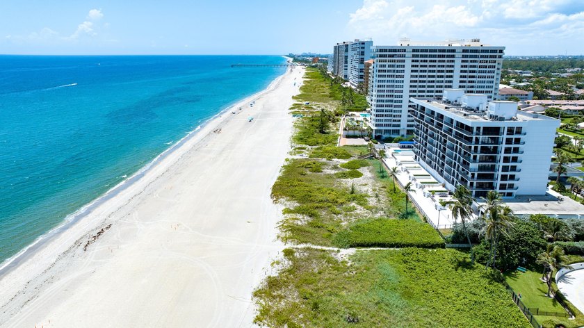 RARELY AVAILABLE BEACHFRONT VILLA OFFERING EFFORTLESS - photo 32