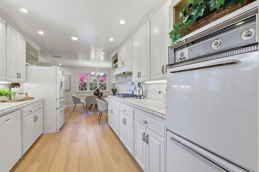 Welcome to this beautifully refreshed ranch-style home in the - photo 12