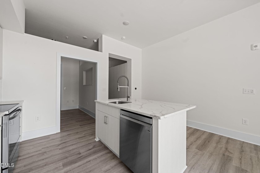 Hidden gem on Centennial Campus! This first-floor condo offers - photo 12