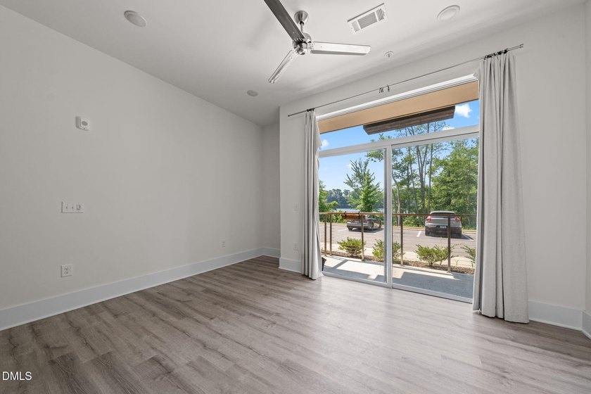 Hidden gem on Centennial Campus! This first-floor condo offers - photo 16
