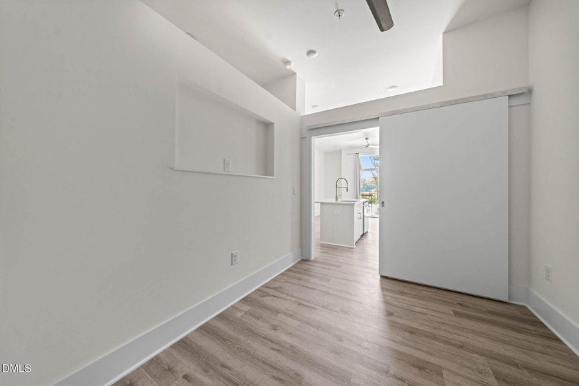 Hidden gem on Centennial Campus! This first-floor condo offers - photo 18