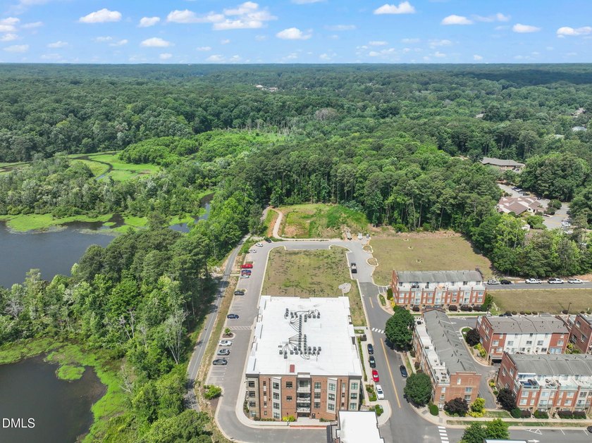 Hidden gem on Centennial Campus! This first-floor condo offers - photo 42