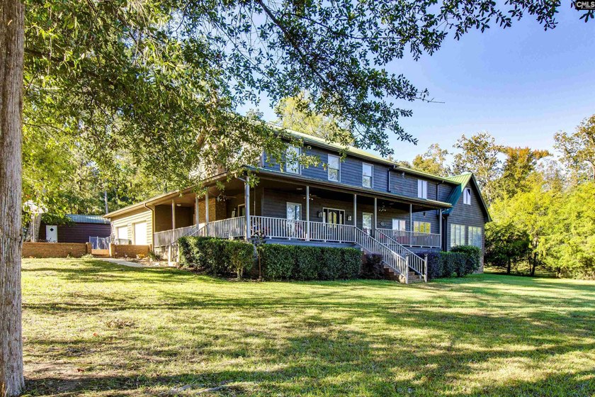 Welcome to this ultimate 4 bed/4.5 bath Lake Murray retreat with - photo 3