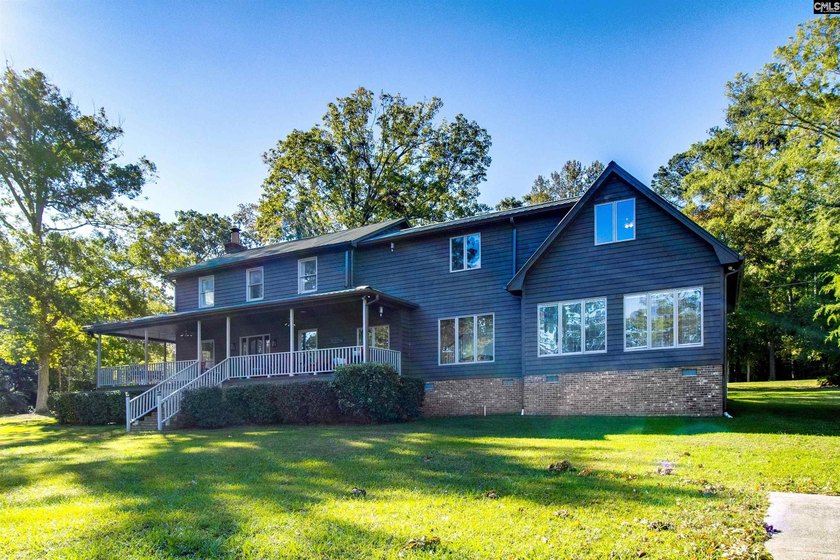 Welcome to this ultimate 4 bed/4.5 bath Lake Murray retreat with - photo 4