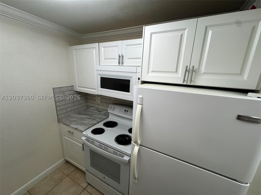Move-in Ready Gem in a Prime Miami Location. Discover this - photo 8