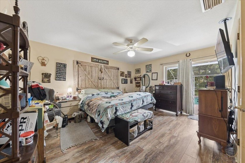 Welcome to this 3-bedroom, 2.5-bathroom pool house located in - photo 39