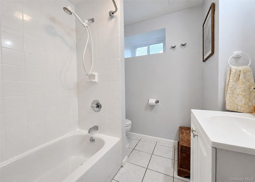 Spacious and open floor plan with cathedral ceilings welcome you - photo 12