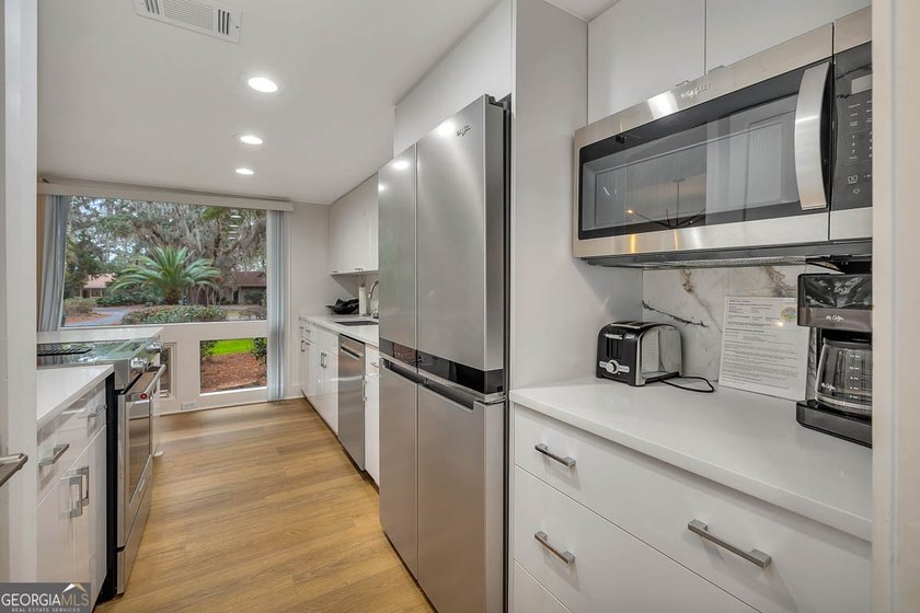 Welcome to your completely renovated retreat in the heart of the - photo 14