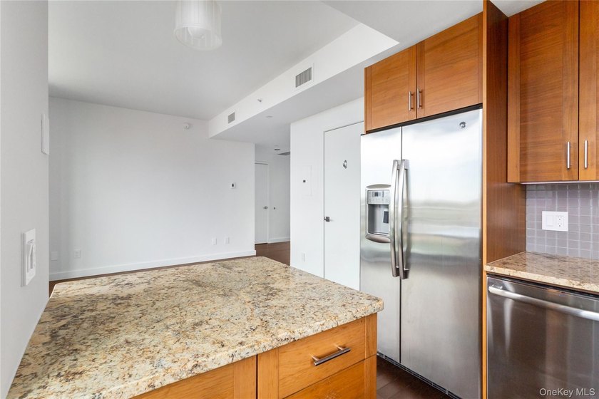 Welcome to Unit 9C at The Aston, a bright and modern high-floor - photo 11