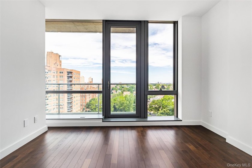 Welcome to Unit 9C at The Aston, a bright and modern high-floor - photo 17