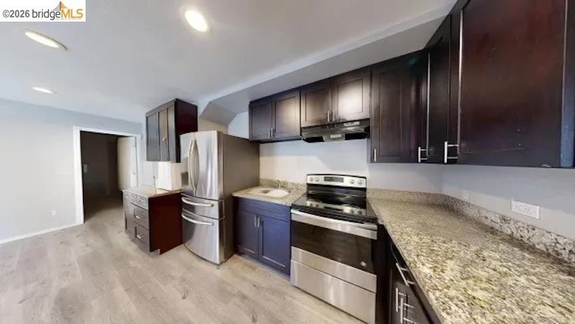Situated along the 75th Avenue corridor less than a mile from - photo 5