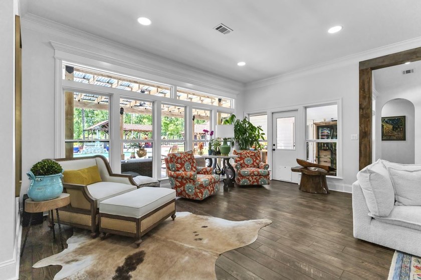 Situated on nearly 5 private acres, this exceptional estate - photo 20
