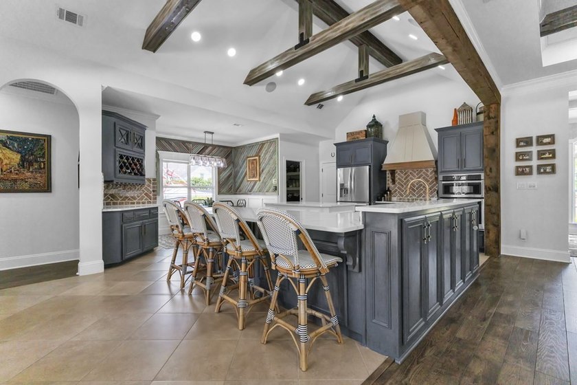 Situated on nearly 5 private acres, this exceptional estate - photo 22