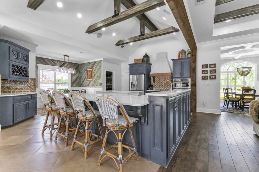 Situated on nearly 5 private acres, this exceptional estate - photo 24