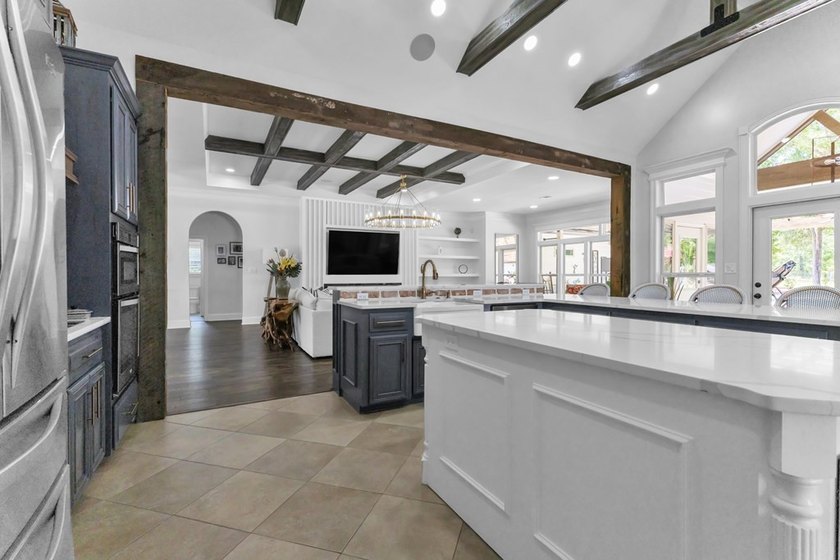 Situated on nearly 5 private acres, this exceptional estate - photo 28