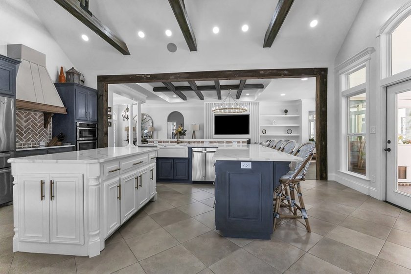 Situated on nearly 5 private acres, this exceptional estate - photo 31