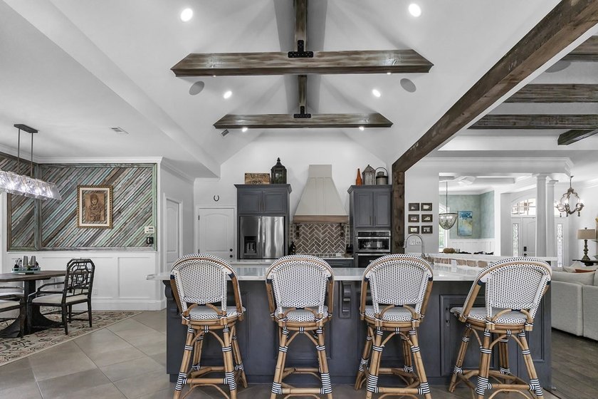 Situated on nearly 5 private acres, this exceptional estate - photo 32