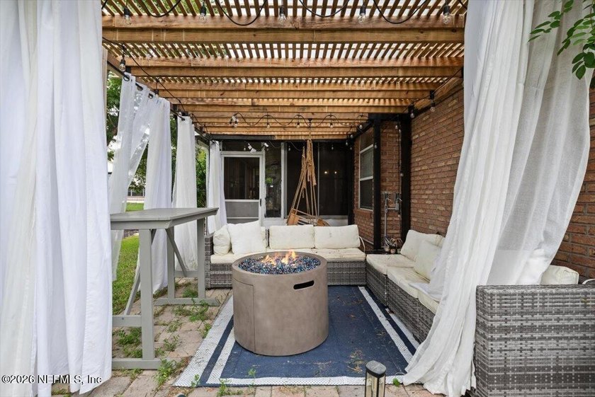 Set on a peaceful waterfront lot in the gated community of The - photo 34