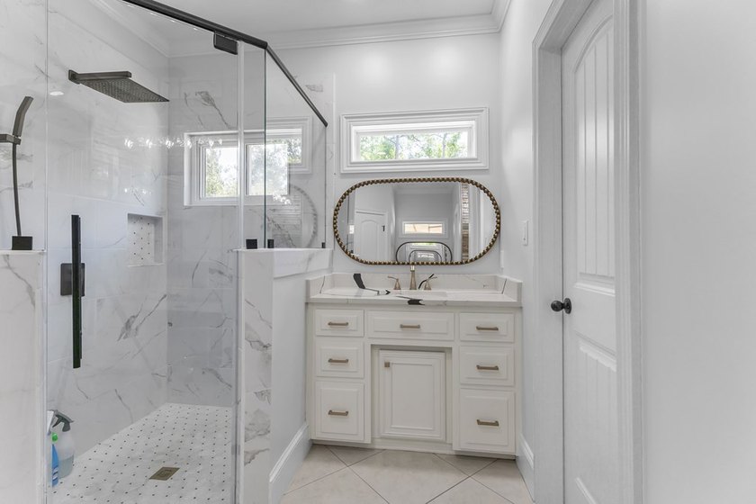 Situated on nearly 5 private acres, this exceptional estate - photo 49