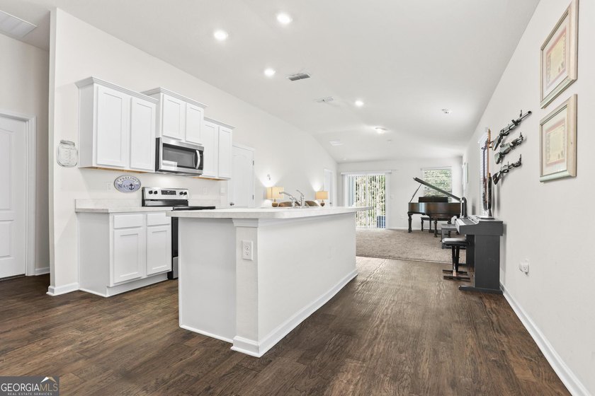 Welcome to Bartram Place! This 3-bedroom, 2-bath home offers a - photo 12