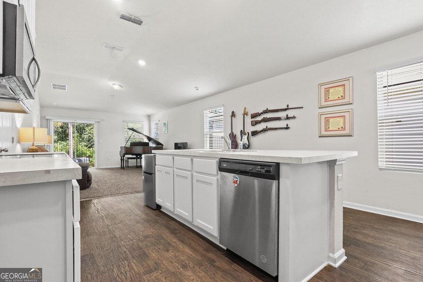 Welcome to Bartram Place! This 3-bedroom, 2-bath home offers a - photo 13