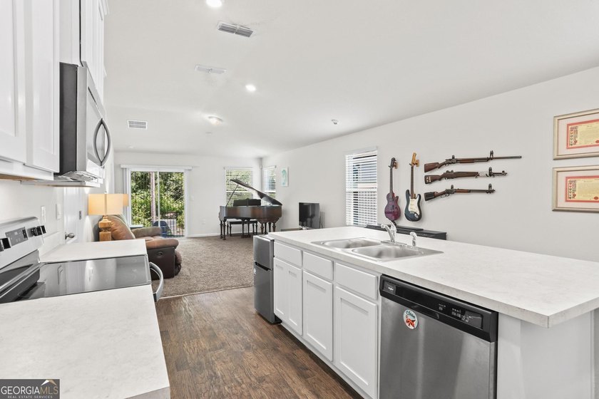 Welcome to Bartram Place! This 3-bedroom, 2-bath home offers a - photo 14