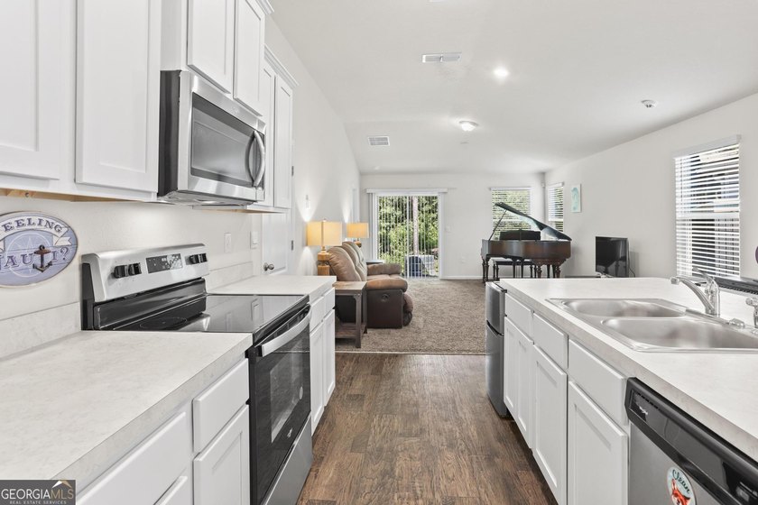 Welcome to Bartram Place! This 3-bedroom, 2-bath home offers a - photo 15