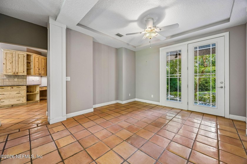 Nestled beneath a canopy of majestic live oaks and surrounded by - photo 15