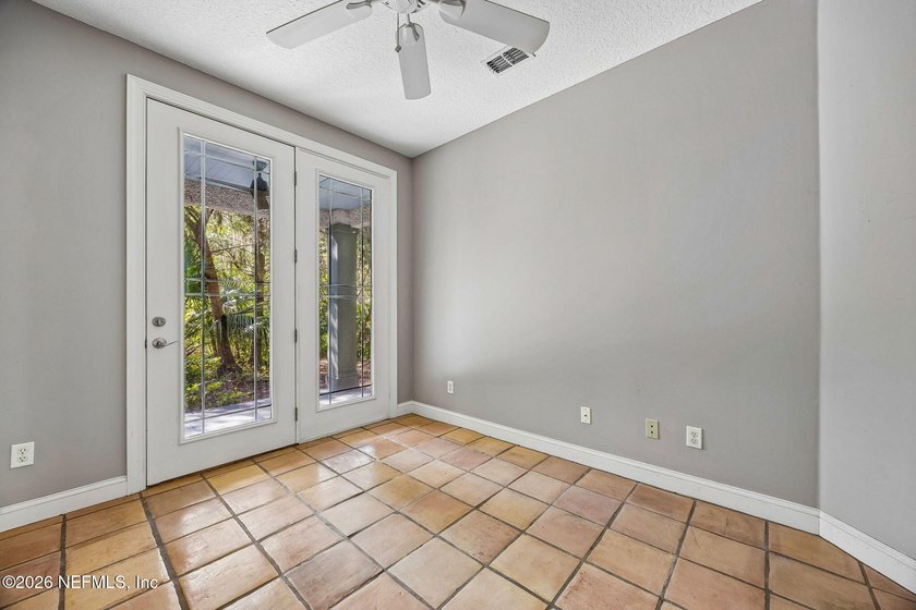 Nestled beneath a canopy of majestic live oaks and surrounded by - photo 16