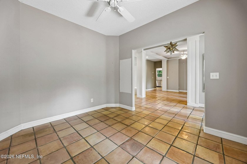 Nestled beneath a canopy of majestic live oaks and surrounded by - photo 17