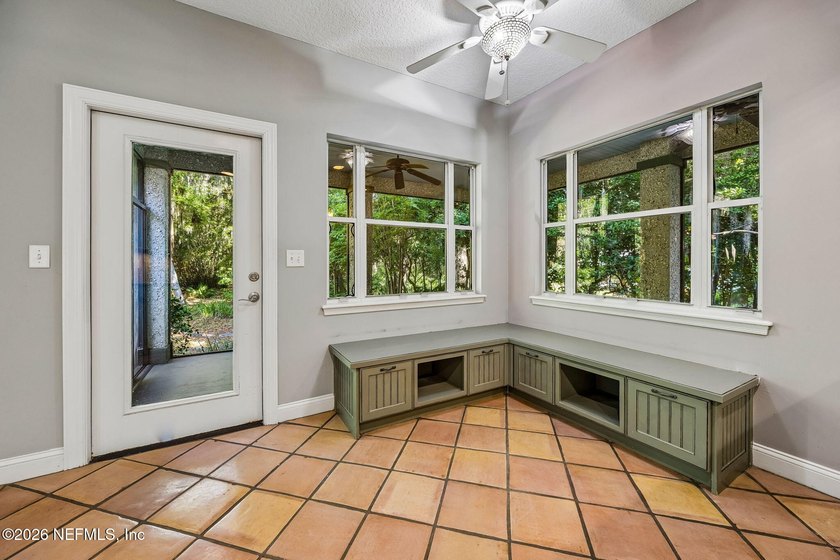 Nestled beneath a canopy of majestic live oaks and surrounded by - photo 19