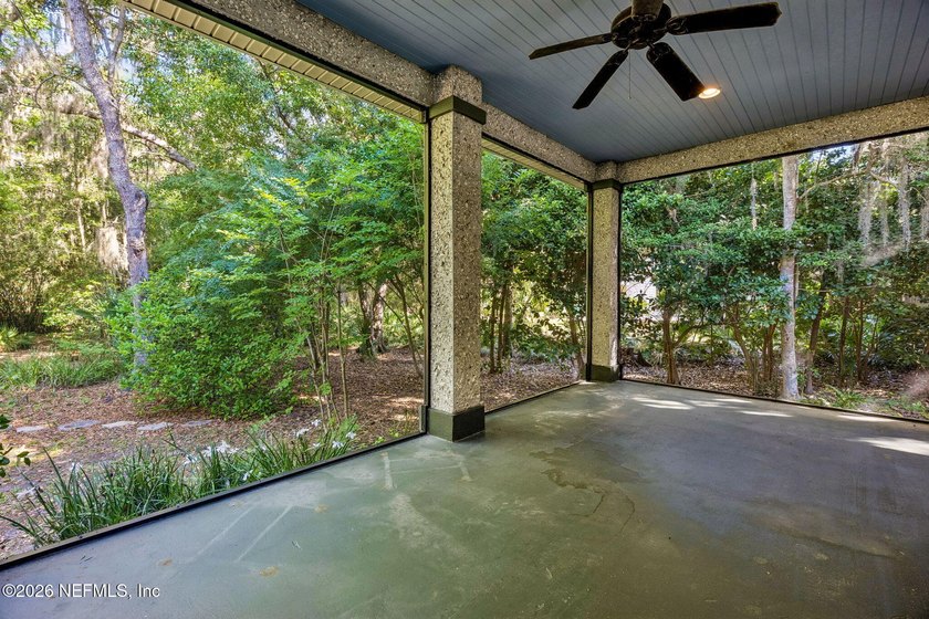 Nestled beneath a canopy of majestic live oaks and surrounded by - photo 20