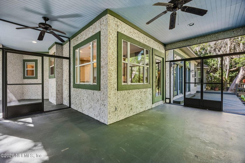 Nestled beneath a canopy of majestic live oaks and surrounded by - photo 21