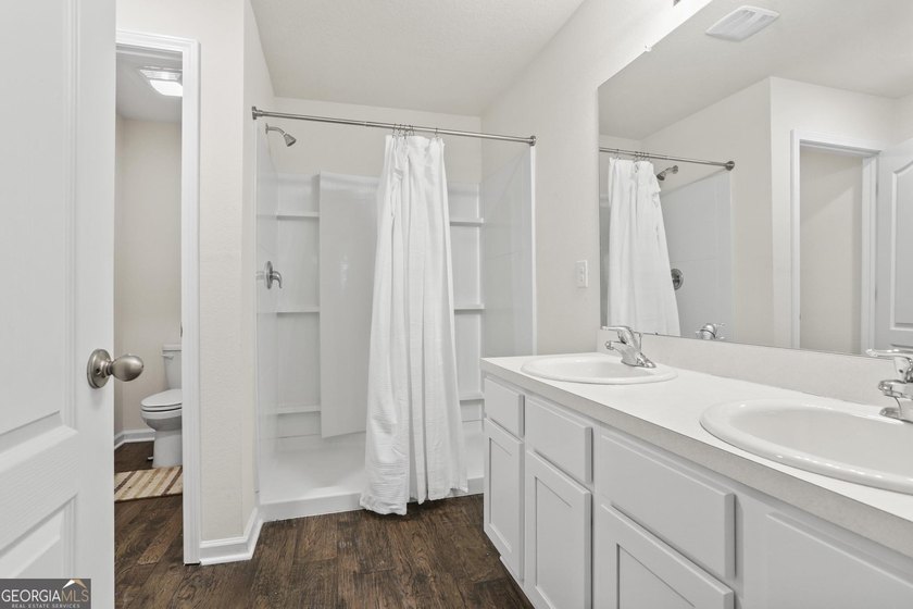 Welcome to Bartram Place! This 3-bedroom, 2-bath home offers a - photo 23