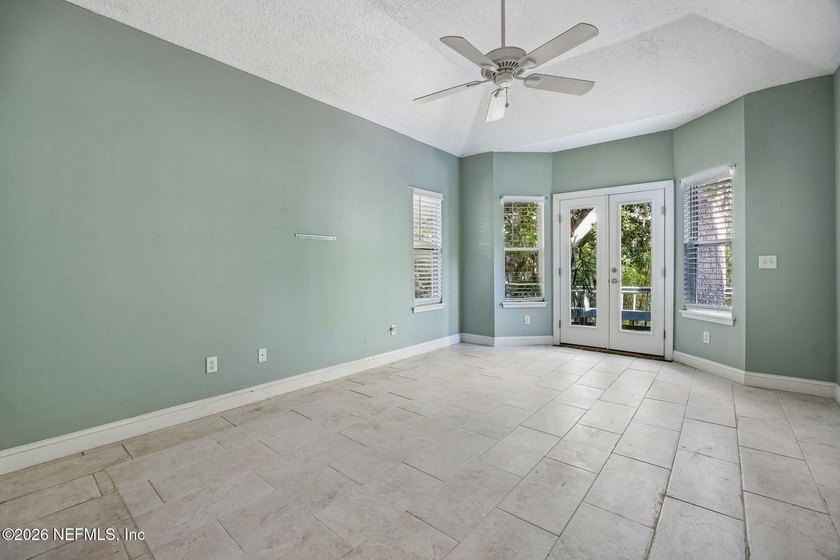 Nestled beneath a canopy of majestic live oaks and surrounded by - photo 27