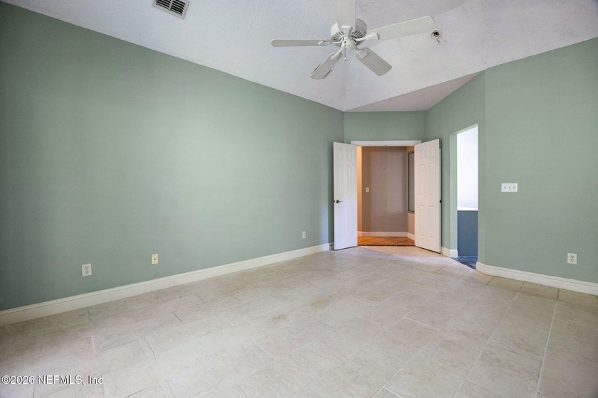 Nestled beneath a canopy of majestic live oaks and surrounded by - photo 28