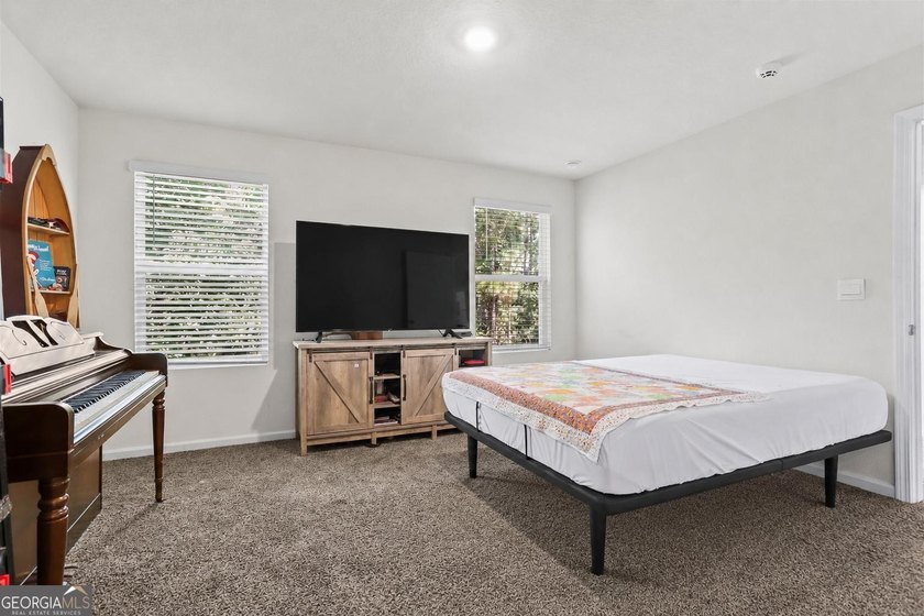 Welcome to Bartram Place! This 3-bedroom, 2-bath home offers a - photo 29