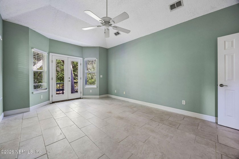 Nestled beneath a canopy of majestic live oaks and surrounded by - photo 29