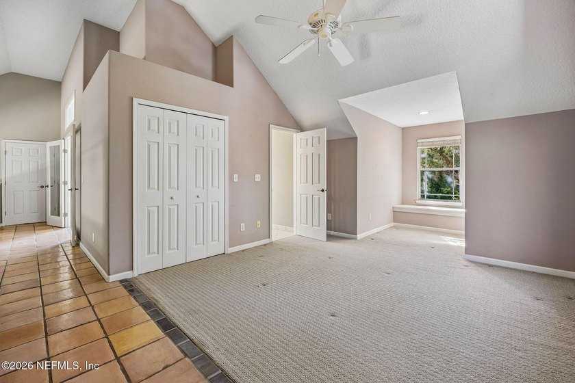 Nestled beneath a canopy of majestic live oaks and surrounded by - photo 32