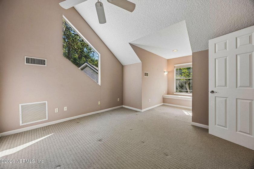 Nestled beneath a canopy of majestic live oaks and surrounded by - photo 36