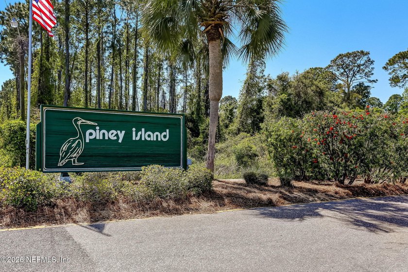 Nestled beneath a canopy of majestic live oaks and surrounded by - photo 43