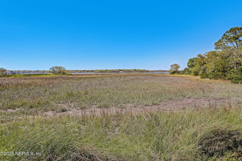 Nestled beneath a canopy of majestic live oaks and surrounded by - photo 44