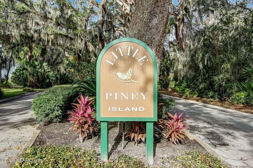 Nestled beneath a canopy of majestic live oaks and surrounded by - photo 46