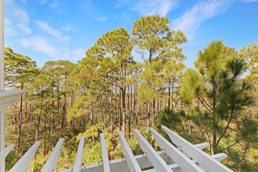 Perfectly positioned as a rare end-unit residence, this - photo 33