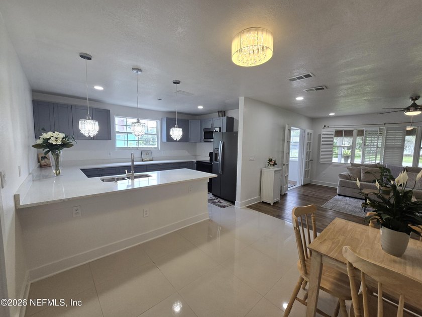 Home on half Acre lot centrally located. Features: New kitchen - photo 5
