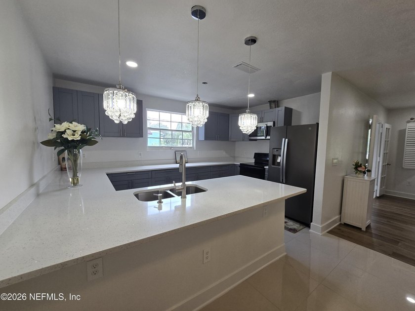 Home on half Acre lot centrally located. Features: New kitchen - photo 6