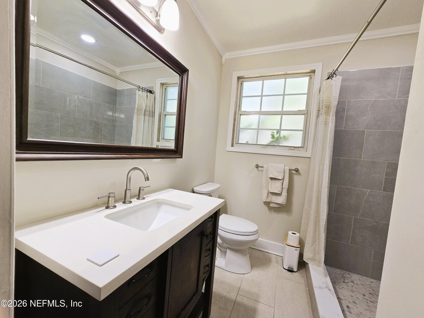 Home on half Acre lot centrally located. Features: New kitchen - photo 10